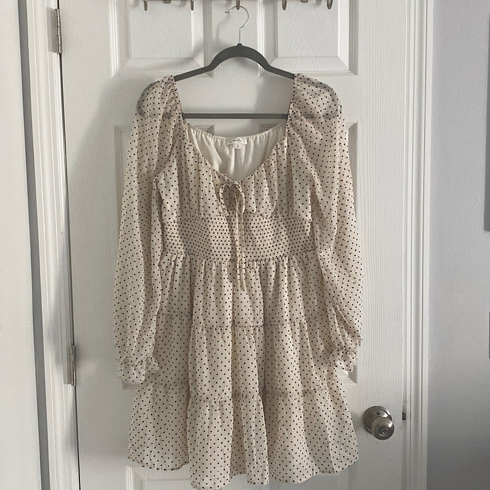 Cute mini crème polka dot baby doll dress
